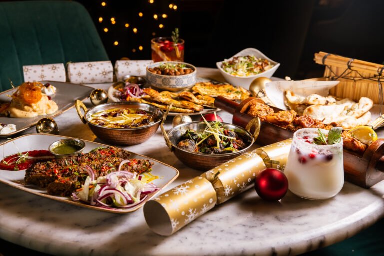 A festive table laid with sharing dishes and crackers